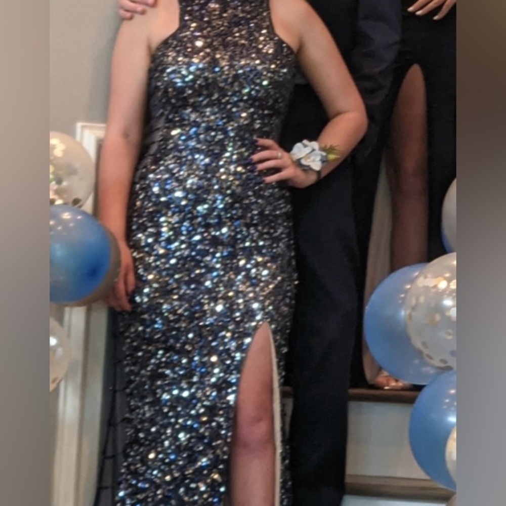 Women’s formal size 4/6 sequin dress with slit nude lining worn once like new